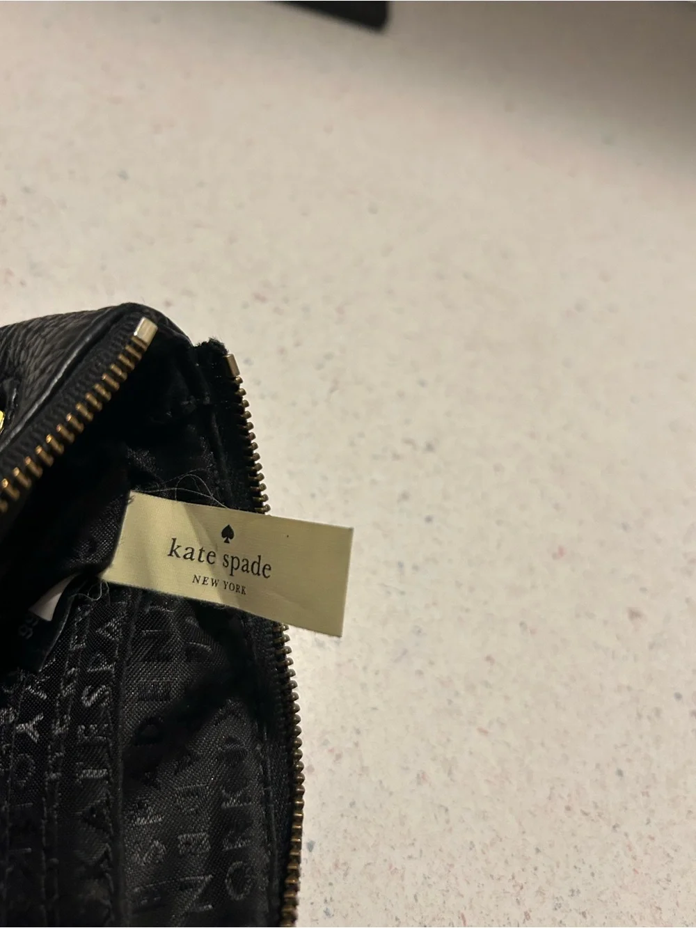 kate spade Black Pebble Leather Wristlet with Tassel
